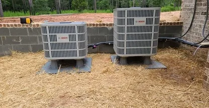 Ground-source heat pump system paired with air handler