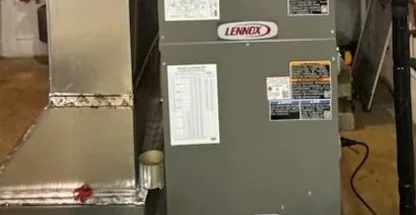 NATE Certified tech inspecting furnace heat exchanger