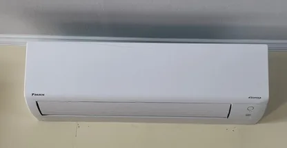 Ceiling-mounted ductless unit inspected during annual tune-up