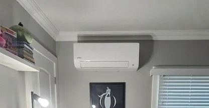 Wall-mounted mini-split indoor unit during diagnostic check