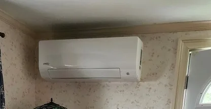 Wall-mounted mini-split indoor unit during filter and coil service