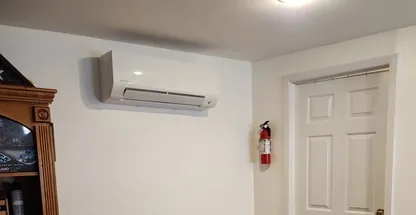Ceiling-mounted ductless unit after professional maintenance and repair