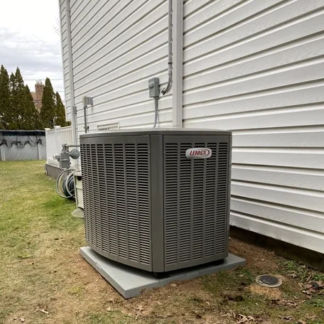 Outdoor condenser unit installed in Suffolk County